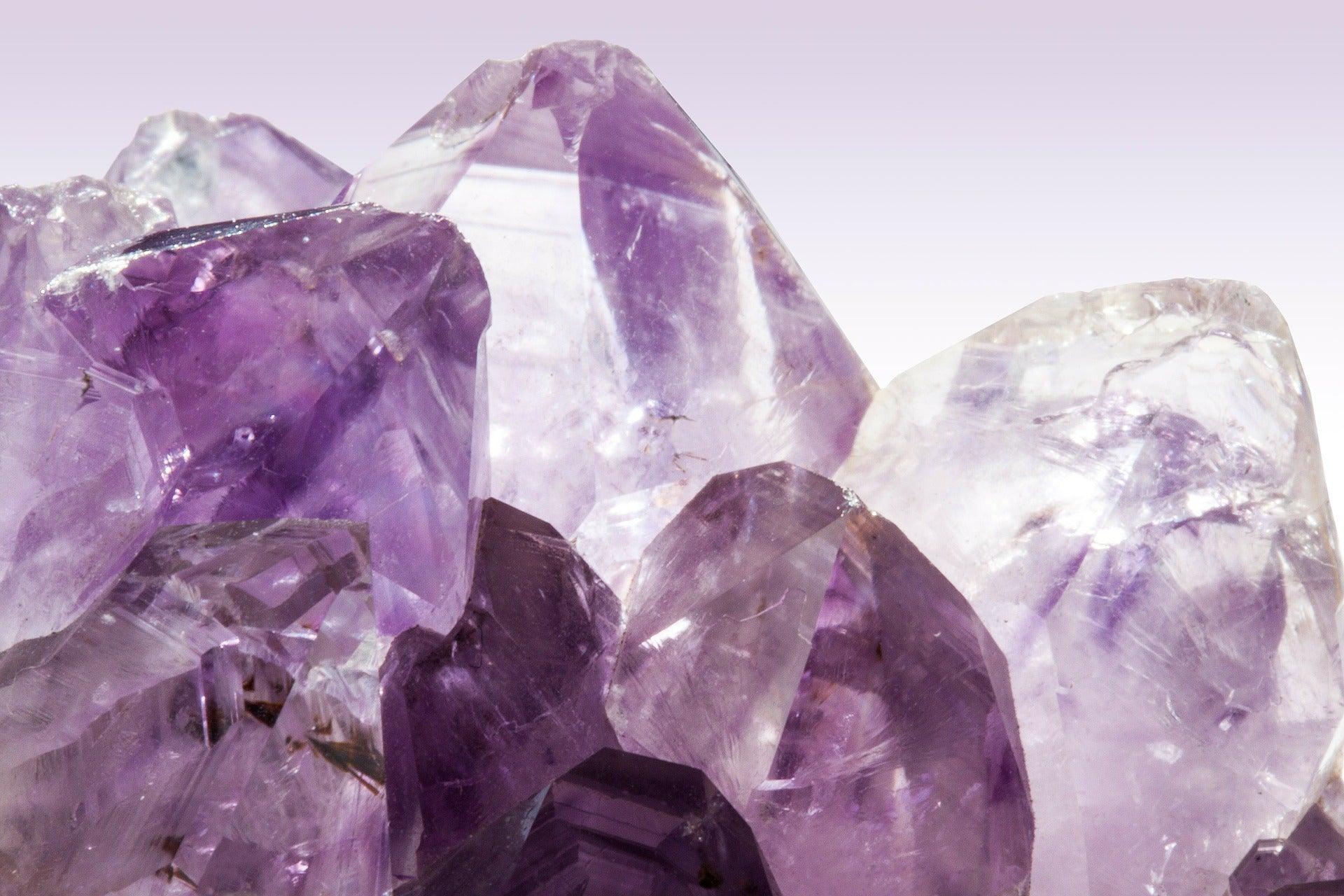 Amethyst Facial Roller - Background - Use on the face - ZAQ Skin & Body