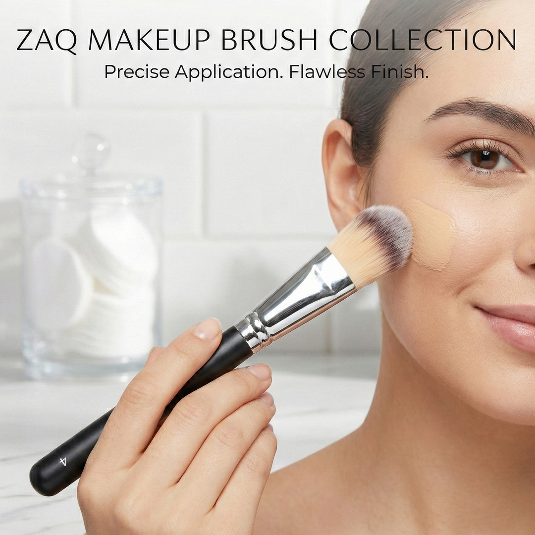 Woman applying makeup with a brush from the ZAQ Makeup Brush Collection.