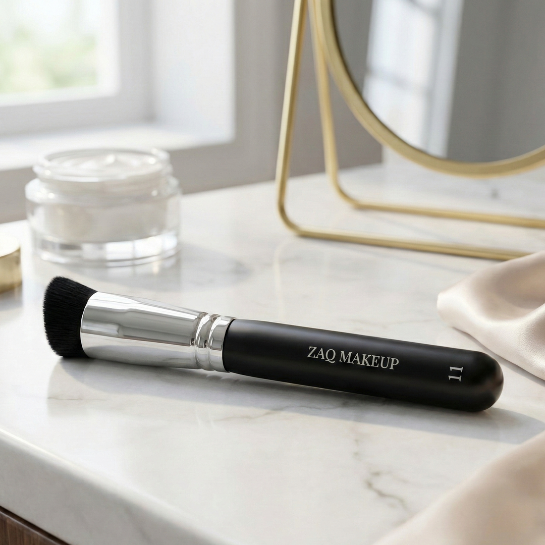 ZAO Makeup brush on a marble surface with a mirror and jar in the background