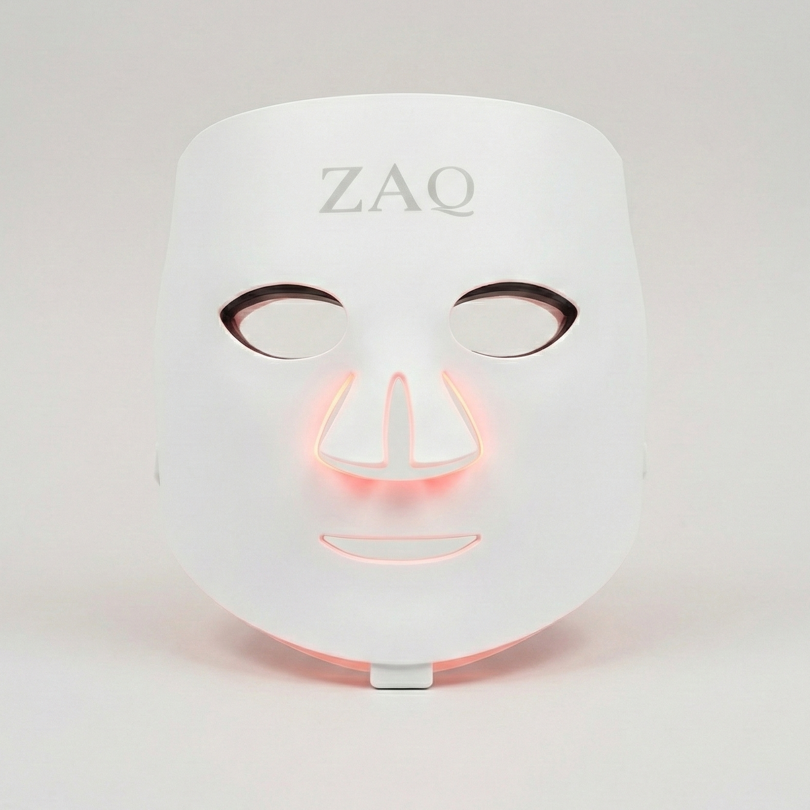 White LED face mask with 'ZAQ' branding on a light gray background