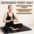 Woman meditating on an infrared PEMF mat with text highlighting its benefits.