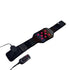 Black massage belt with red lights and control device on a white background