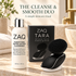 ZAQ Tara silicone facial cleansing brush in black and white shown next to its black packaging box on a marble countertop, with a bottle of purifying exfoliating cleanser behind them. Text at the top reads 'THE CLEANSE & SMOOTH DUO'.