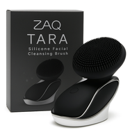 Black silicone facial cleansing brush with packaging labeled 'ZAQ Tara' on a white background