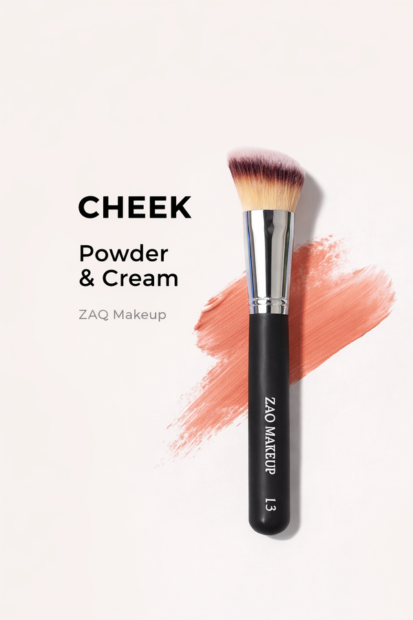 Makeup brush with pink blush stain and 'ZAQ Makeup' branding on a light background
