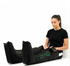 Person using a black leg compression device with ZMQ logo on a white background