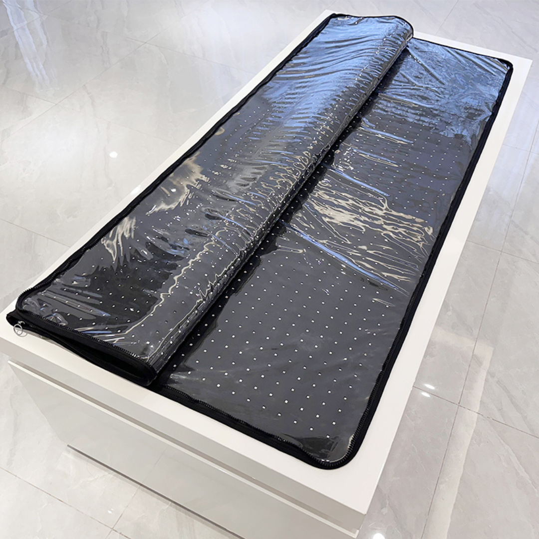 Black mat with reflective surface on a white platform