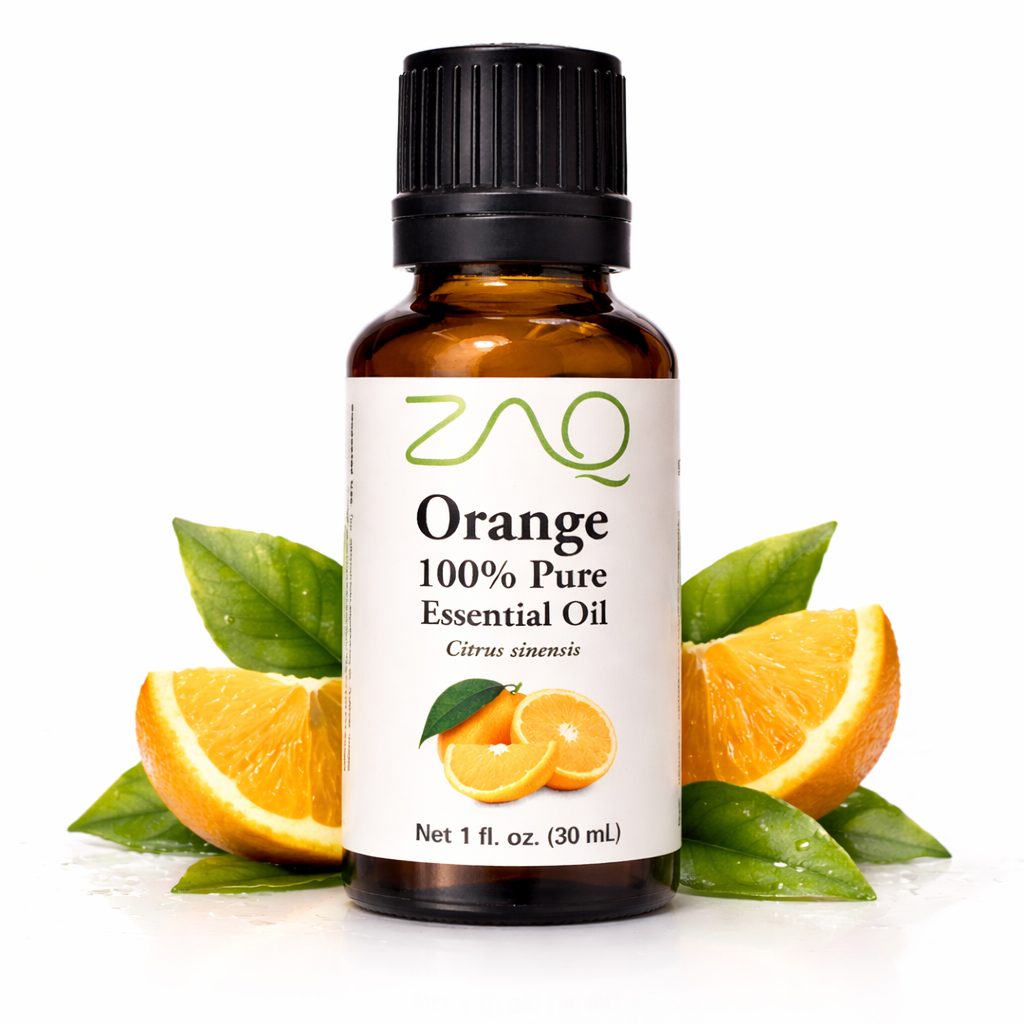 Bottle of ZAO Orange essential oil with oranges and leaves on a white background
