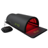 A black red light therapy hood with its control panel and cable, shown on a clean white background. The device is illuminated with red LED lights, and the green 'zq' logo is visible on the hood and mat.
