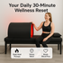 Woman using a black and red therapy device with text about daily wellness reset on a gray background.